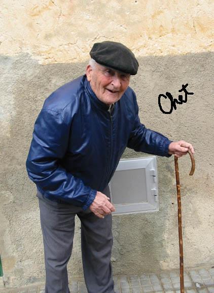 chet in snappy hat autographed.jpg